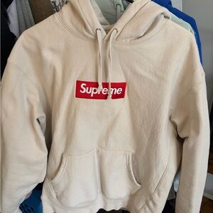 Supreme Cream Hoodie with Red Logo Tag